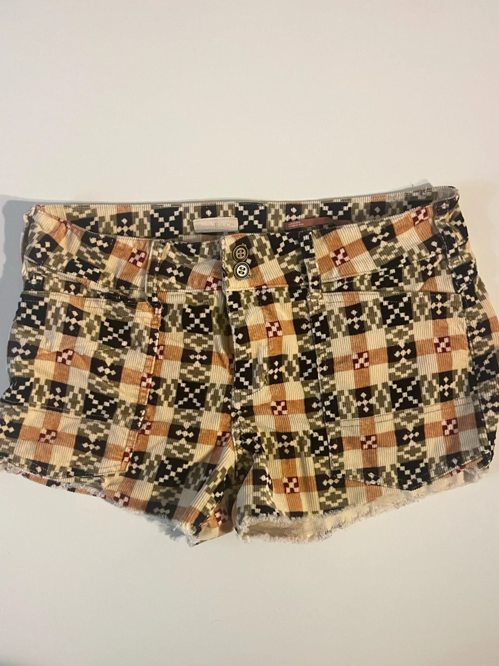 Pilcro | Anthropologie The Wanderer Low Rise Raw Edge Corduroy Geometric Shorts